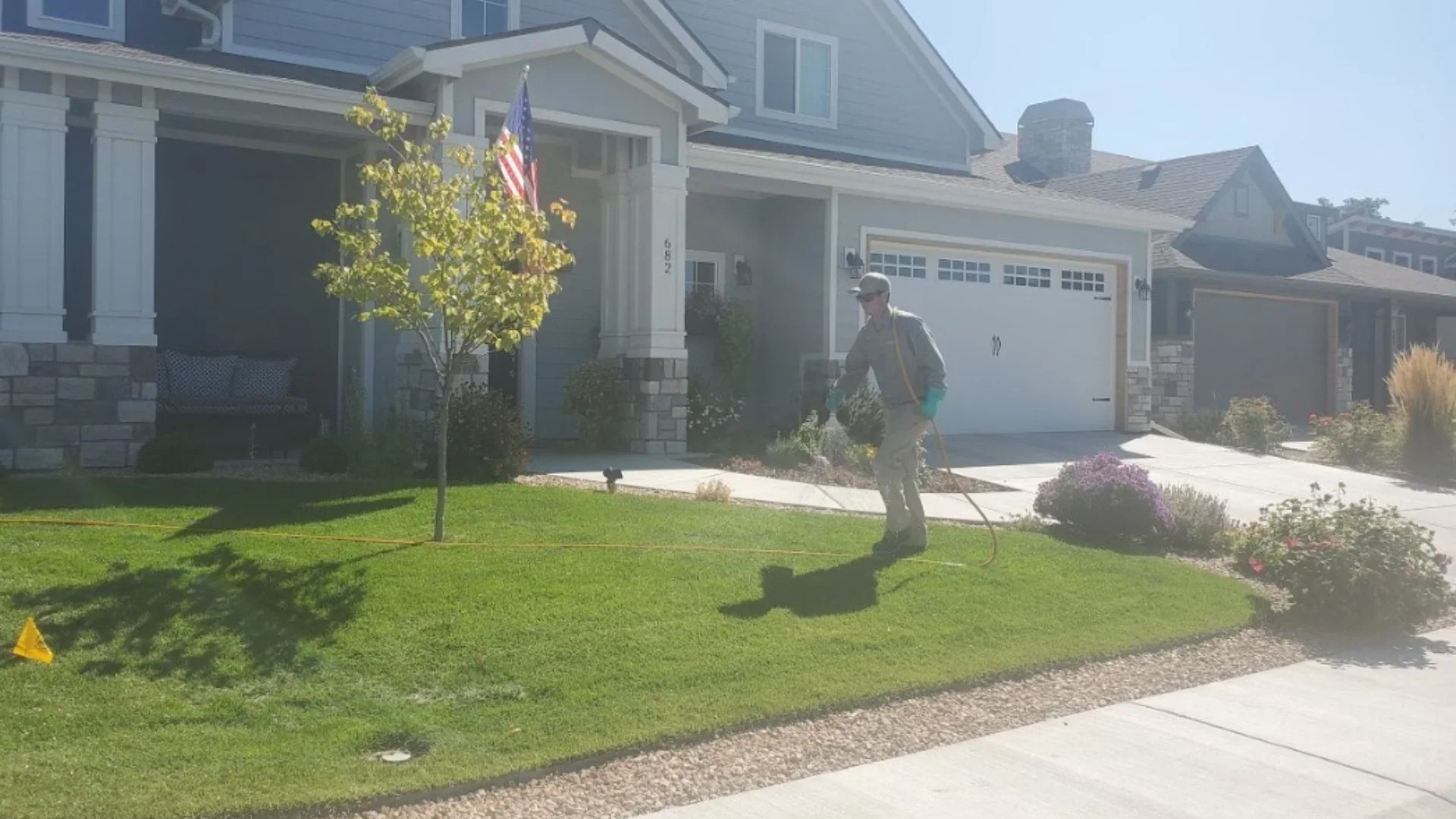 Lawn fertilizer treatment on a Grand Valley property