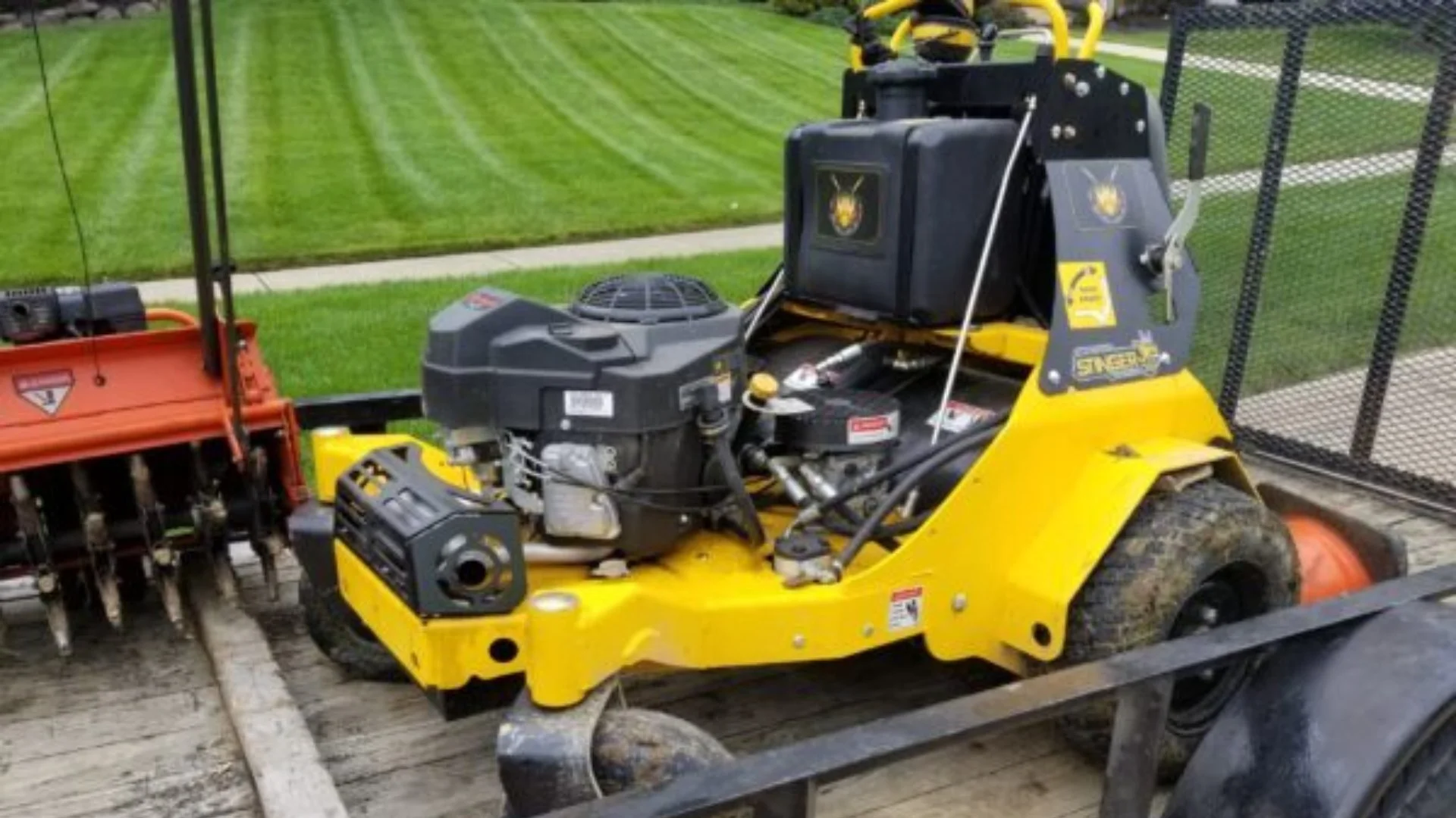 A closeup of a high quality aeration machine aerating a lawn in Grand Junction, CO.