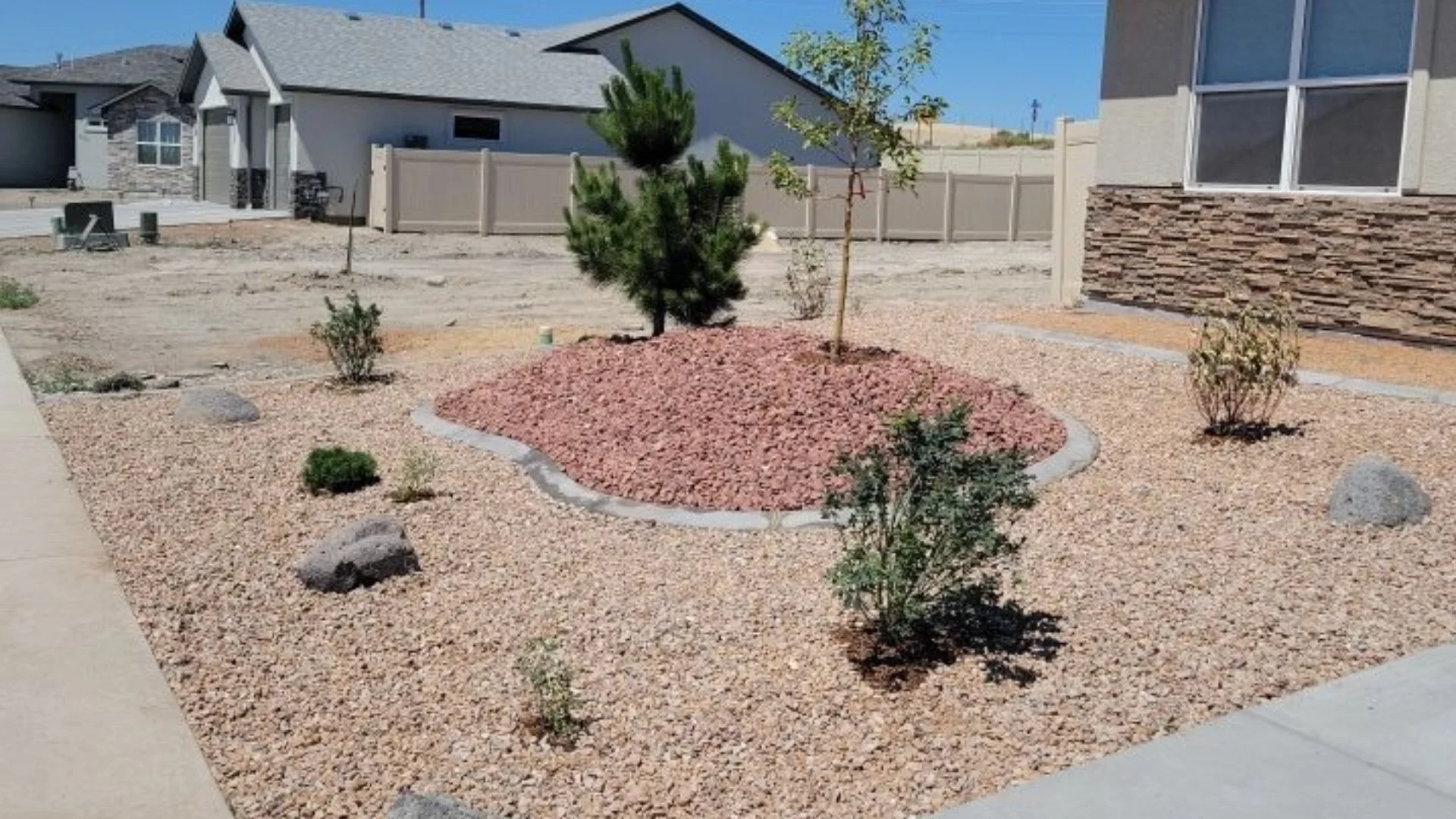 Common Reasons That Weeds Sprout Through Rock Landscaping