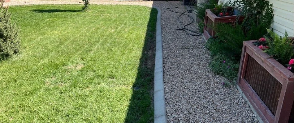 Landscape bed with rocks along the side of a house in Grand Junction, CO.